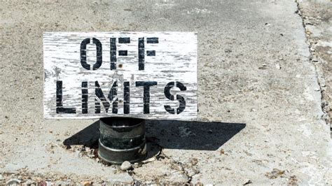 Wooden Sign Saying Off Limits Standing on Cement Stock Photo - Image of black, caution: 156595278