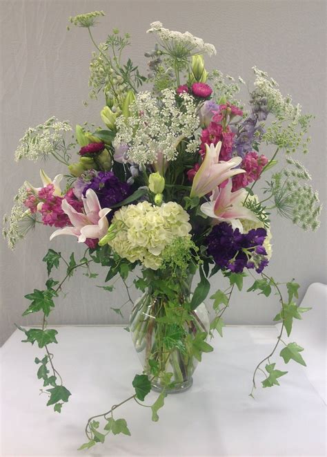 Summer wild flower bouquet including hydrangea, lilies, stock queen ...