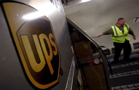 UPS Earnings Surge, Gives Optimistic Guidance - WSJ