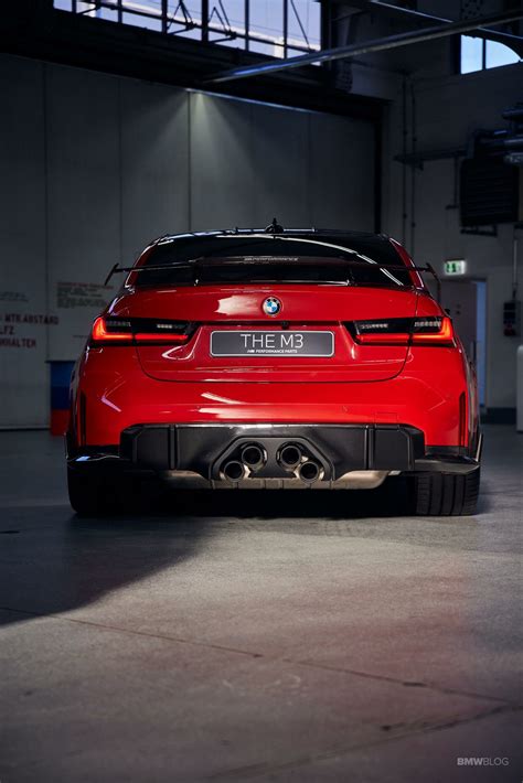 BMW M3 in Toronto Red and featuring carbon fiber accessories