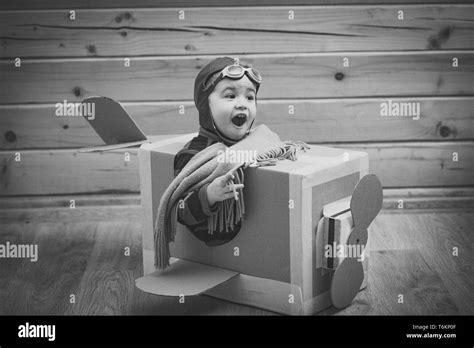 Small child in a cardboard box Black and White Stock Photos & Images - Alamy