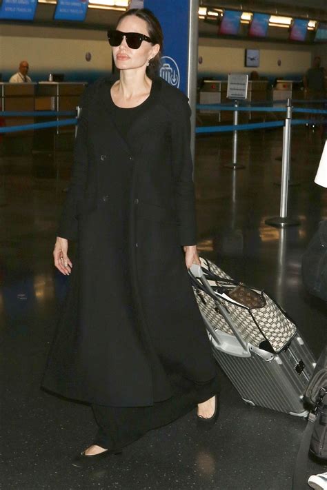 Angelina Jolie Perfects the Stealthy-Chic Airport Look | Vogue