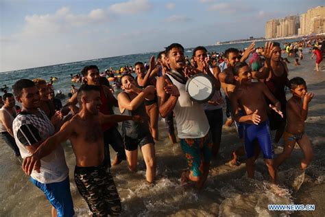 People enjoy leisure time in summer at beach of Alexandria, Egypt ...