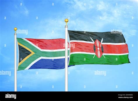 South Africa and Kenya two flags on flagpoles and blue sky Stock Photo ...