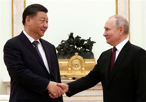 Putin visits 'dear friend' Xi in show of no-limits partnership ...