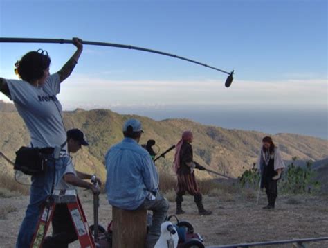 film techniques - Why does the boom operator have to hold the boom mic ...