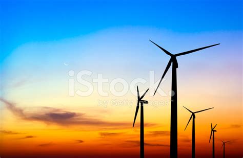 Wind Turbine Silhouette On Colorful Sunset Stock Photo | Royalty-Free ...