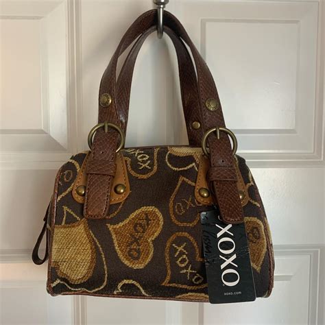 XOXO Brand Hand bag Got it from my mom as she had... - Depop