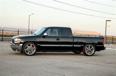 2002 GMC Sierra performance lowering with , Baer brakes, QA1, Hellwig, Continental Tires, US Mags