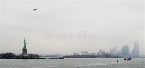 Statue of Liberty with Manhattan Skyline and Helicopter Stock Image - Image of icon, skyscraper ...