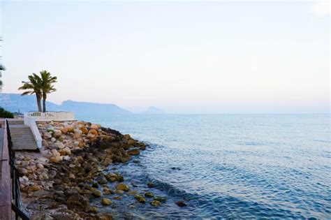 Premium Photo | Gorgeous spanish beach in summertime at sunset