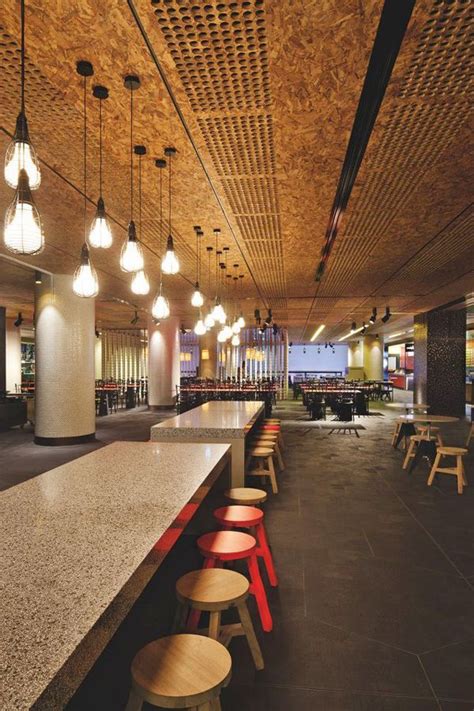 long tables and colourful stools | Chipboard interior, Ceiling design ...