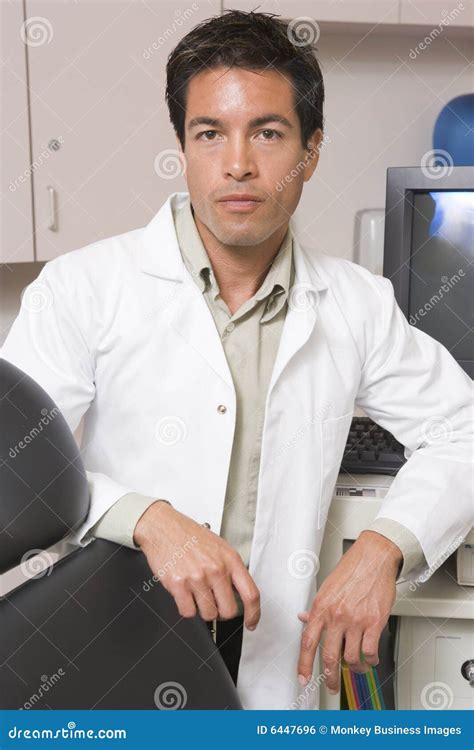 A Doctor Standing by a Computer Monitor Stock Photo - Image of skill, chair: 6447696