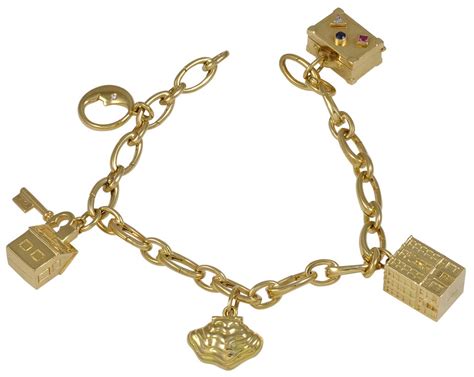 TIFFANY&CO Gold Charm Bracelet with Signature Charms at 1stDibs ...