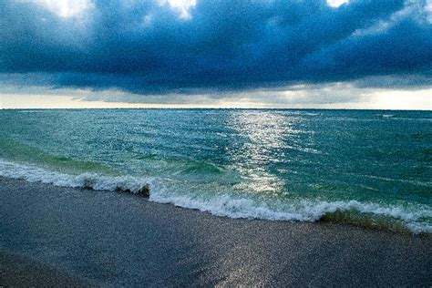 Cloudy Sky Beach Photograph by Linda Steele