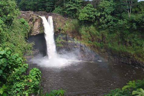 Rainbow Falls in Hilo. Seen best before 10 a.m. See the rainbow to the right of the falls ...