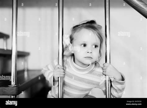 Little girl stairs house Black and White Stock Photos & Images - Alamy