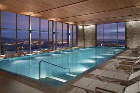 Burgenstock Hotel & Alpine Spa – Obburgen, Switzerland – Alpine Spa Indoor Pool Evening View ...