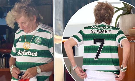 Celtic super fan Sir Rod Stewart dons the club's kit as he watches their match while in ...