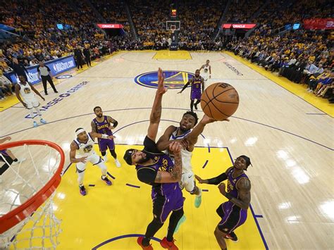 Watch: Andrew Wiggins lands massive dunk over Anthony Davis