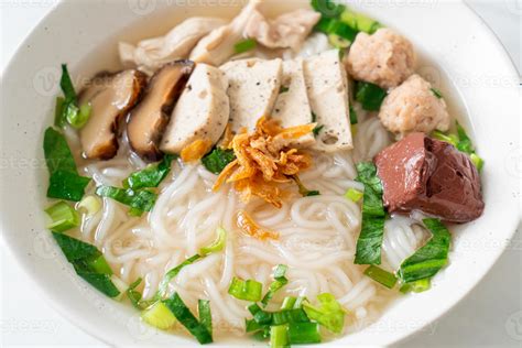 Vietnamese Rice Noodles Soup with Vietnamese Sausage served vegetables ...