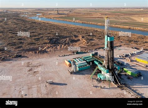 Loving, New Mexico - An oil drilling rig along the Pecos River in the ...