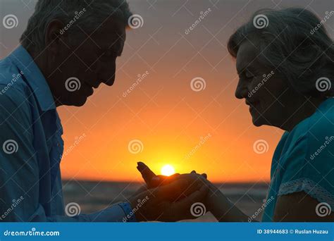 Silhouette Of An Elderly Couple Stock Photo - Image: 38944683