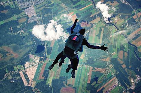 Parachute Jumping Stock Photo - Download Image Now - iStock