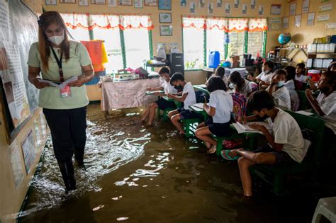 Tropical storm injures 3, displaces thousands in Philippines | PBS News