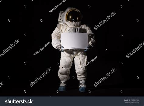 Isolated Astronaut White Space Suit Holds Stock Photo 1998307208 ...