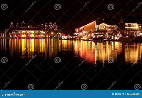 Christmas Lights Reflecting on Lake Stock Photo - Image of night, blue: 1687272