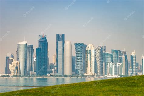 Premium Photo | Panoramic view of modern skyline of Doha with green ...