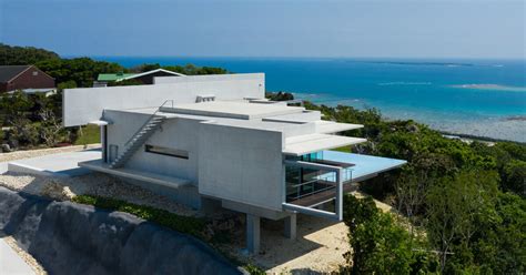 concrete hilltop villa by kidosaki architects studio overlooks the ...