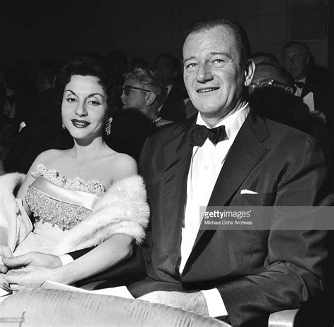 John Wayne and his wife Pilar attend a movie premiere in November ...