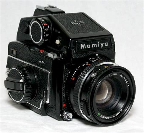 My Mamiya M645 | with 70mm leaf-shutter lens. Acquired bruis… | Flickr