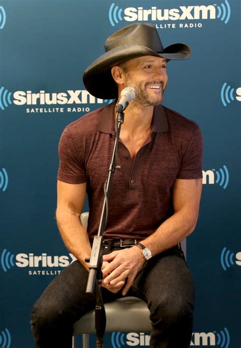 Tim McGraw's signature cowboy hat was perfectly placed when he ...