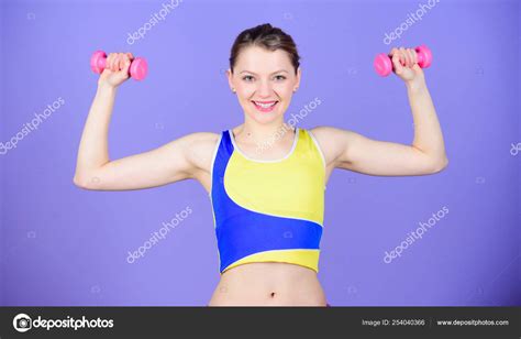 Living healthy life. Healthy lifestyle concept. Woman exercising with dumbbells. Fitness ...
