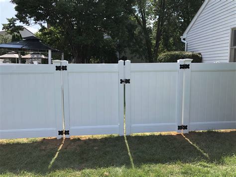 white vinyl fence and gate inspiration for low maintenance privacy and security | Smucker Fencing