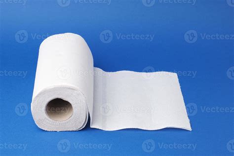 twisted roll of white paper towel on a blue background 19188005 Stock ...