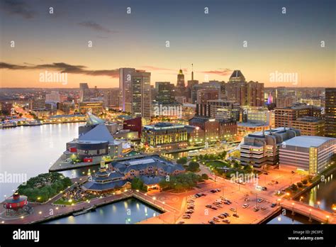 Baltimore, Maryland, USA inner harbor and downtown skyline at dusk ...