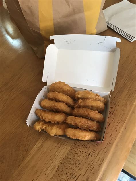 I opened my chicken nuggets and found them filed perfectly in my ...