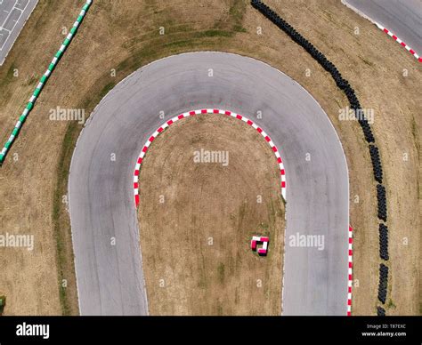 Curves on karting race track, aerial view background Stock Photo - Alamy