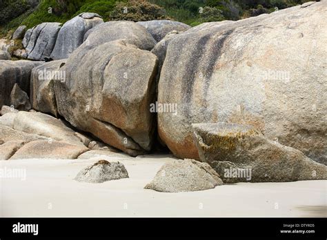 Rock formations on the beach front Stock Photo - Alamy