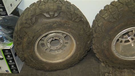 Qty 4 Grapplers 33x13.50R 15 LT Mud Truck Tires & Rims - Oahu Auctions