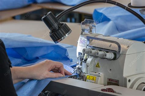 Making medical gowns during Covid-19 outbreak - Stock Image - C048/9245 - Science Photo Library