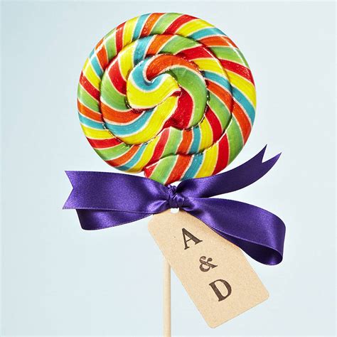 personalised giant rainbow swirly lollipop by sophia victoria joy etc | notonthehighstreet.com