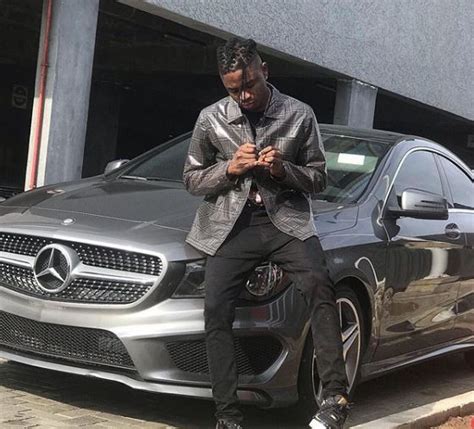 Photos: Lil Kesh shows off his brand new Mercedes Benz whip (Photos)