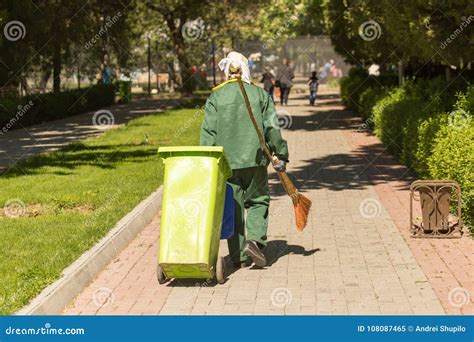 Janitor with a Broom in the Park Stock Image - Image of road, garden ...