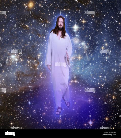 Jesus walking in the heavens and stars Stock Photo - Alamy