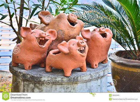 Laughing pig statue stock image. Image of hand, making - 38452905